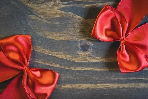 Flatlay of some Red typical Christmas decorations, on a dark wooden background. Stock Photos