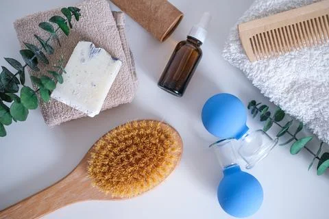 Flatlay spa items. massage jars and a brush. Body and face care. Massage cups Stock Photos