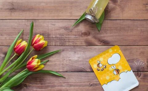 Flatlay Spring Easter bouquet of tulip flowers with cosmetic products, mask 스톡 사진