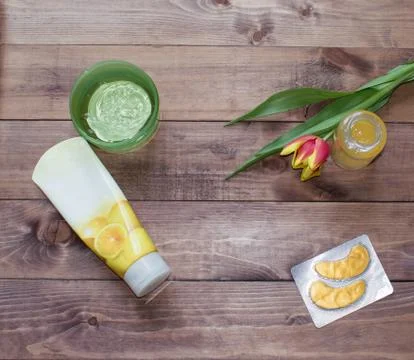 Flatlay Spring Easter tulip flower with cosmetic products, patches on wooden Stock Photos