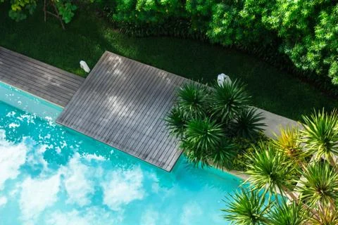 Flatlay sunbathing terrace pool side. Stock Photos