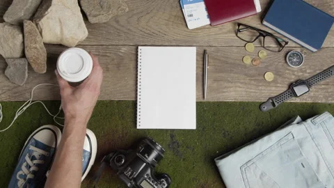 Flatlay with things for hiking and a notebook Video stock 201673381