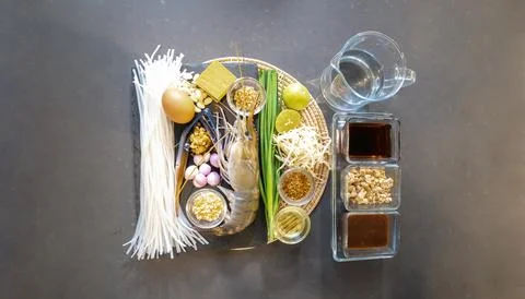 Flatlay Top Table of Pad Thai has a main ingredient such as noodle, shrimp,.. Stock Photos