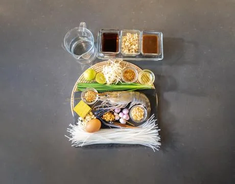 Flatlay Top Table of Pad Thai has a main ingredient such as noodle, shrimp,.. Stock Photos