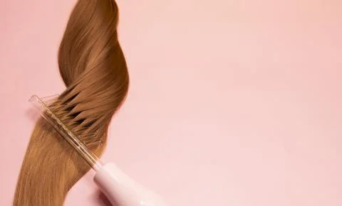 Flatly Darsonval or d'Arsonval, electrotherapy device with comb tube, brown hair Stock Photos