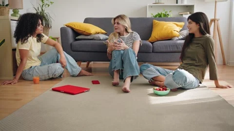 Flatmate girl friends having fun talking, laughing and enjoying breakfast Stock Footage 307021175