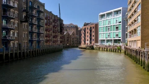 Flats and buildings at Java wharf in Shad Thames, London. Renovation Video stock 335816527