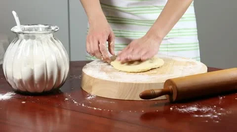 Flattening Dough Stock Footage 22324698