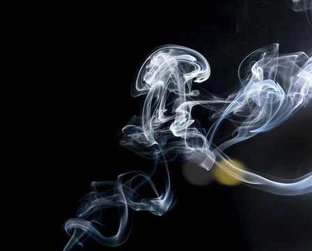  Flavored incense smoke burning. dramatic black background. Salvador Bahia... Fotos de archivo