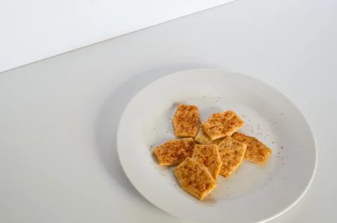 Flavoured biscuits on a plate Stock Photos