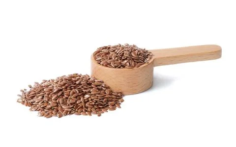 Flax seed close up on white background. Stock Photos