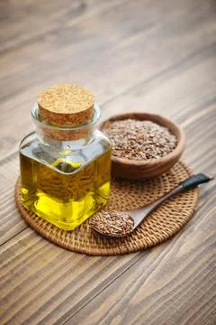 Flax seeds and oil Stock Photos
