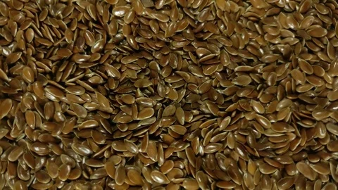 Flax seeds as background Stock Footage 76122428