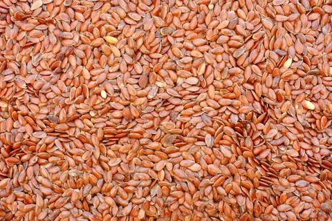 Flax seeds background Stock Photos