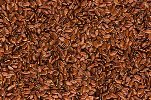 Flax seeds background Stock Photos
