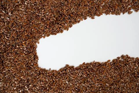 Flax Seeds Border on White Background. Healthy Superfood Stock Photos