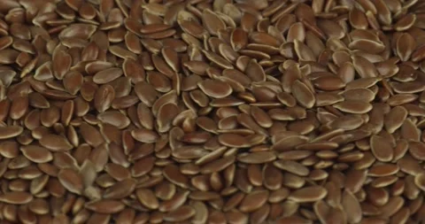 Flax seeds closeup rotating selective focus Stock Footage 168800736