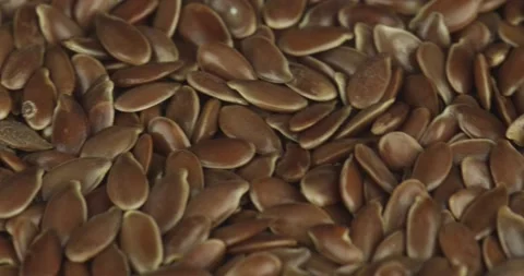 Flax seeds closeup rotating selective focus Stock Footage 199629138