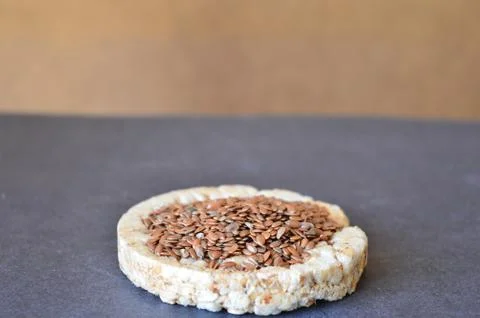 Flax seeds on the white bread Stock Photos