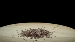 https://images.pond5.com/flax-seeds-wooden-board-footage-106493427_iconm.jpeg