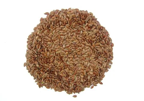 Flaxseeds on white background  Stock Photos