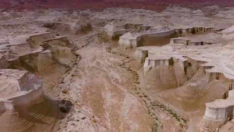 Flaying over Desert mountain cliffs Stock Footage 153749246