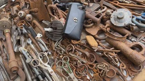 A flea market of old rusty things and tools. Photos