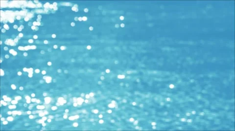 Flecks of sunlight sparkle in fast moving water current. 스톡 동영상 53427397