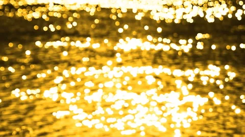 Flecks of sunlight sparkle in fast moving water current. 스톡 동영상 53430152