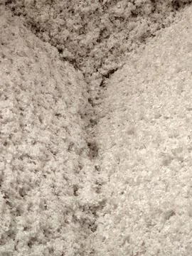 Fleecy surface. Light pile. Light flake background Stock Photos