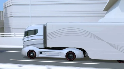 A fleet of autonomous trucks driving on highway Stock Footage