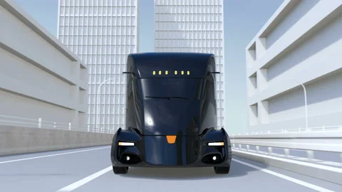 A fleet of black self-driving electric semi trucks driving on highway Stock Footage 85775558
