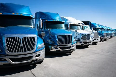 Fleet of blue 18 wheeler semi trucks Stock Photos