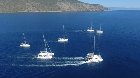 Fleet of sailing yachts Stock Footage 128504890