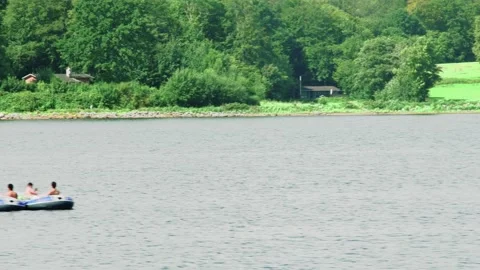 Flensburg, Germany - August 20, 2023.view from a passing ship to a wooded sh Stock-Footage 260833570