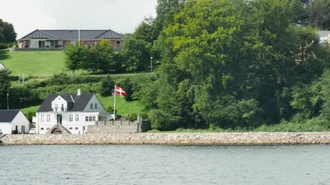 Flensburg, Germany - August 20, 2023.view from a passing ship to the shore w 스톡 동영상 260833780