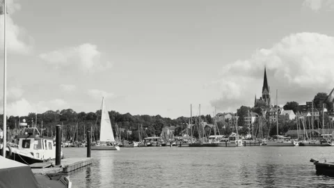 Flensburg, Germany - August 20,2023. Timelapse of the opposite shore of Flen Vídeos de archivo 253558535