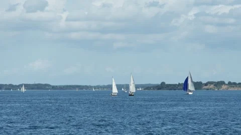 Flensburg, Germany - Denmark - August 20, 2023. Sailing yachts and sea kayak 스톡 동영상 253529660