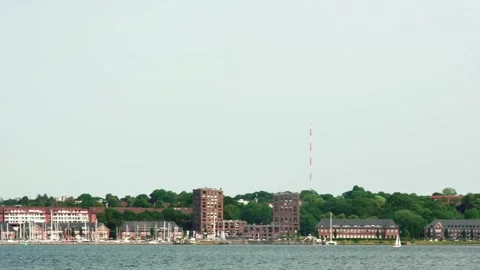 Flensburg, Germany - July 9, 2023. view from the opposite shore of buildings Vídeos de archivo 260347327