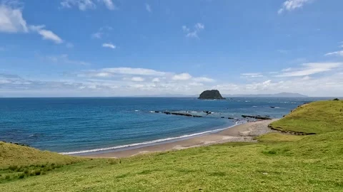 Fletcher Bay and its Rolling Hills along the remote Coromandel Coastal Walk.. Stock Footage 284882622