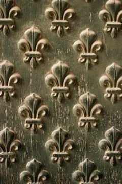 Fleur de lis pattern on door Stock Photos