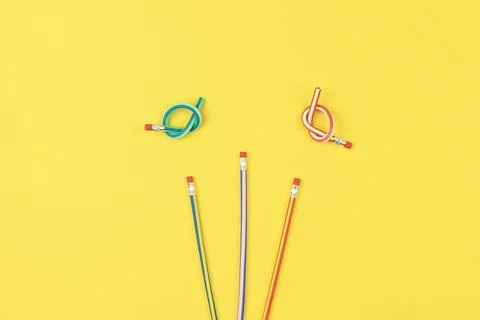 Flex pencils on yellow background, increase creative potential for playful ki Stock Illustration