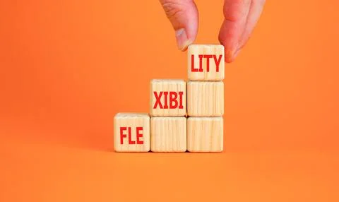 Flexibility symbol. Concept word Flexibility on beautiful wooden blocks. Bu.. Stock Photos