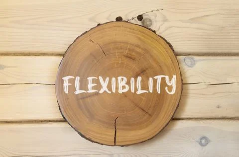 Flexibility symbol. Concept word Flexibility on beautiful wooden circle. Be.. Stock-Fotos