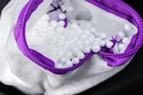 Flexible bean bag inside. Frameless chair filled with polystyrene balls. Mo.. Stock Photos
