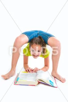 Flexible contortionist kid girl with homework book Stock Photos