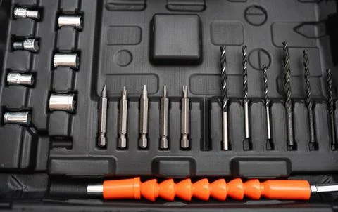 Flexible extension shaft with screwdriver bits Stock Photos