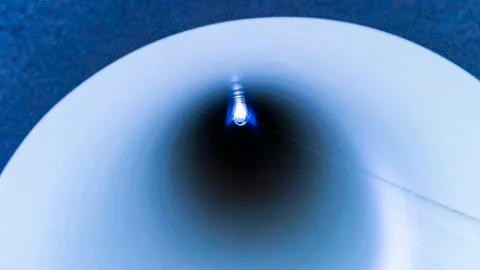 Flexible pipe, design, background and surface. Look from inside the tube. Stock Photos