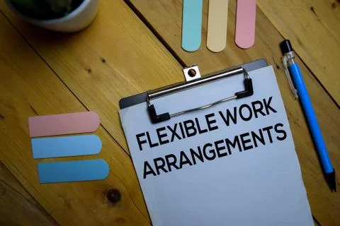 Flexible Work Arrangements write on a paperwork isolated on wooden background 스톡 사진