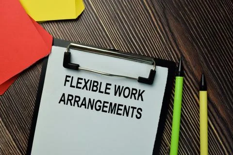 Flexible Work Arrangements write on a paperwork isolated on wooden background Stock Photos